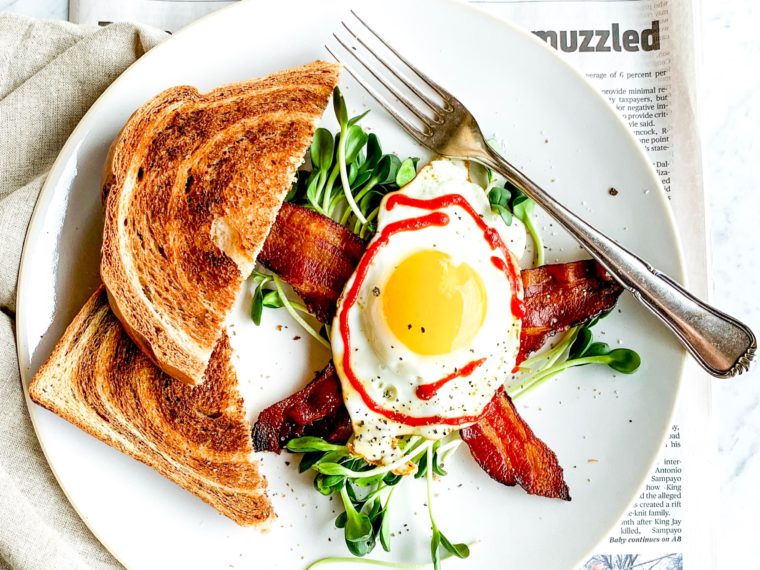 Marble Rye Toast w/a Sunny Egg, Sprouts & Bacon
